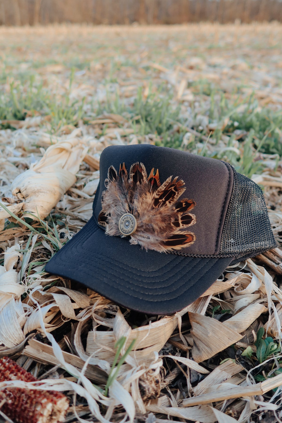 Outlaw Brass Trucker Hat